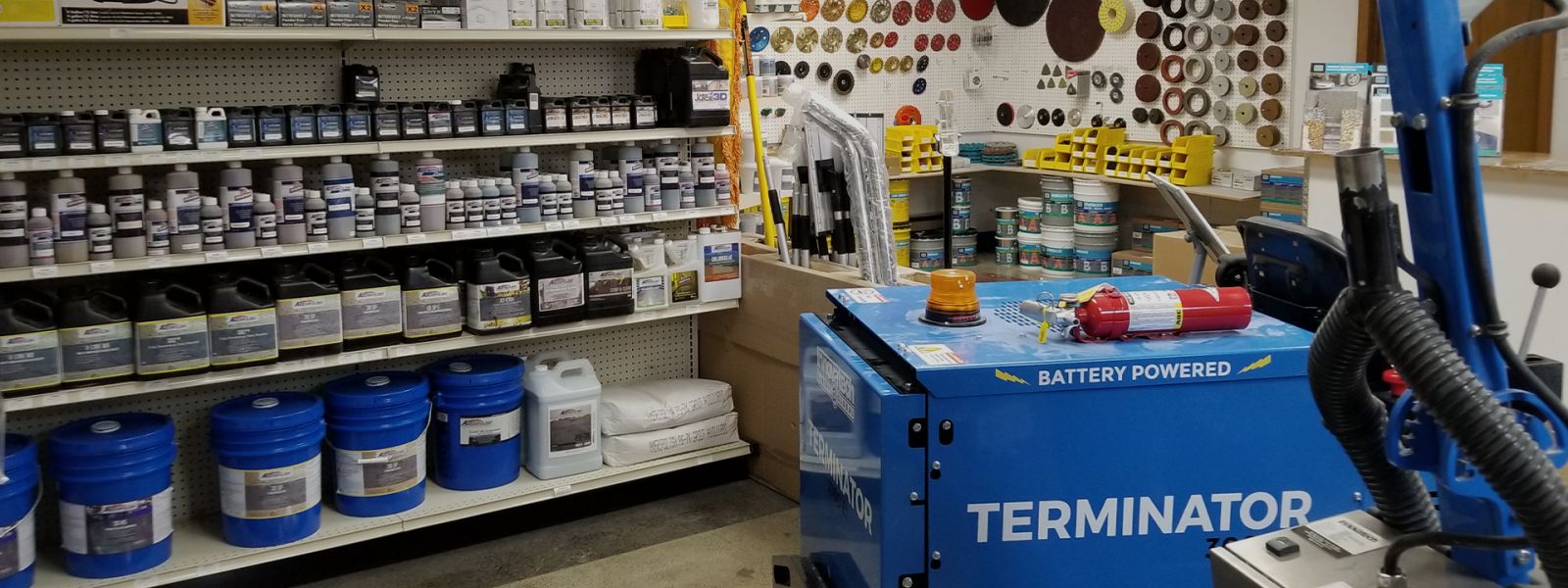 Products arranged on shelves inside Surface Prep SuperStore Washington